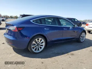 2019 Tesla Model 3 Mid Range with VIN 5YJ3E1EA6KF412837, listed as a Copart auction lot 50871195 with 39,570 mi miles and Salvage Title. Bid and sale history available at DreamBid. Image 3.