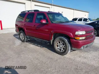 2004 Chevrolet Tahoe Z71 z VIN 1GNEK13T14R275140, wystawiony jako IAAI lot #41986825 z przebiegiem 256 057 mil mil oraz . Historia ofert i sprzedaży dostępna na DreamBid. Obrazek 1.