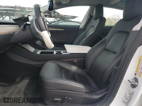 2023 Tesla Model 3 with VIN 5YJ3E1EA5PF413923, listed as a Copart auction lot 49008435 with 28,373 mi miles and Salvage Title. Bid and sale history available at DreamBid. Image 7.