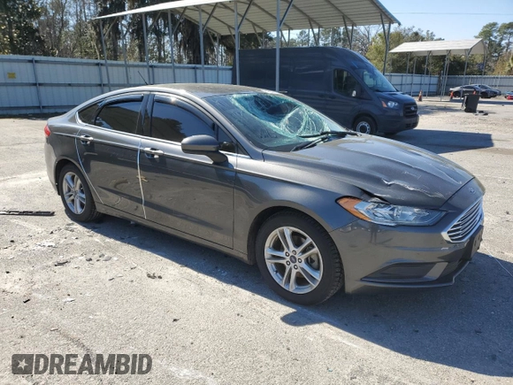 2018 Ford Fusion SE with VIN 3FA6P0HD1JR252599, listed as a Copart auction lot 45666525 with 61,405 mi miles and Salvage Title. Bid and sale history available at DreamBid. Image 4.