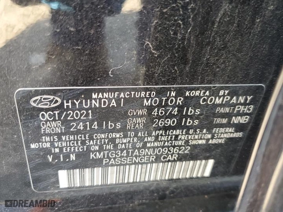 2022 Genesis G70 2.0T with VIN KMTG34TA9NU093622, listed as a Copart auction lot 77797024 with 51,637 mi miles and Salvage Title. Bid and sale history available at carsss.com. Image 12.