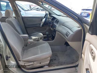 1999 Nissan Altima XE with VIN 1N4DL01D6XC179556, listed as a IAAI auction lot 41783234 with 129,064 mi miles. Bid and sale history available at carsss.com. Image 5.