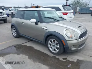 2010 MINI Hardtop S with VIN WMWMF7C53ATX45077, listed as a IAAI auction lot 41784399 with 79,233 mi miles and . Bid and sale history available at DreamBid. Image 1.