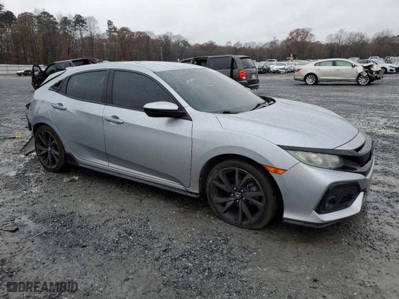 2018 Honda Civic Hatchback Sport with VIN SHHFK7H46JU219132, listed as a Copart auction lot 84083554 with 102,131 mi miles and Salvage Title. Bid and sale history available at carsss.com. Image 4.