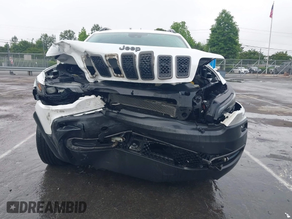 2022 Jeep Cherokee Trailhawk with VIN 1C4PJMBX1ND500729, listed as a IAAI auction lot 42235098 with 60,354 mi miles and . Bid and sale history available at DreamBid. Image 12.
