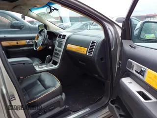 2008 Lincoln MKX with VIN 2LMDU68C58BJ11726, listed as a IAAI auction lot 42146388 with 146,293 mi miles. Bid and sale history available at carsss.com. Image 5.