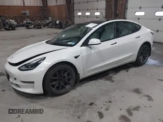 2021 Tesla Model 3 Long Range with VIN 5YJ3E1EBXMF051060, listed as a IAAI auction lot 41958018 with 65,631 mi miles. Bid and sale history available at carsss.com. Image 2.
