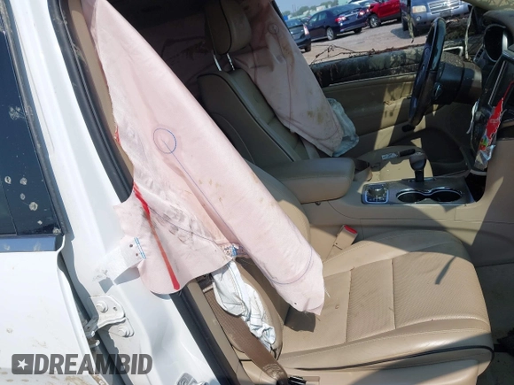 2015 Jeep Grand Cherokee Overland with VIN 1C4RJFCGXFC880096, listed as a IAAI auction lot 42706085 with 74,044 mi miles and . Bid and sale history available at DreamBid. Image 5.