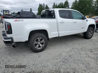 2018 Chevrolet Colorado 4WD Z71 with VIN 1GCPTDE11J1140908, listed as a Copart auction lot 59673205 with 104,799 mi miles and Clean title. Bid and sale history available at DreamBid. Image 3.
