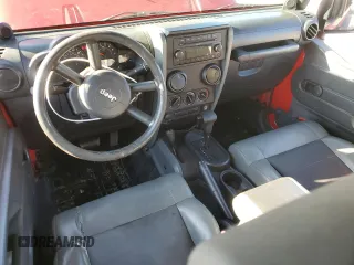 2009 Jeep Wrangler X with VIN 1J4FA24199L720554, listed as a Copart auction lot 88129665 with 67,840 mi miles and Salvage title. Bid and sale history available at DreamBid. Image 8.