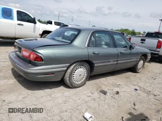1999 Buick LeSabre Limited with VIN 1G4HR52K2XH469117, listed as a Copart auction lot 61813585 with 149,090 mi miles and Salvage title. Bid and sale history available at DreamBid. Image 3.