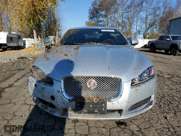 2015 Jaguar XF V6 Portfolio with VIN SAJWA0F7XF8U51105, listed as a Copart auction lot 82865814 with 62,807 mi miles and Salvage Title. Bid and sale history available at carsss.com. Image 5.