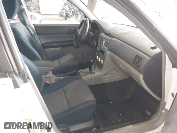 2007 Subaru Forester X with VIN JF1SG63637H736844, listed as a IAAI auction lot 40371482 with 166,328 mi miles. Bid and sale history available at carsss.com. Image 5.