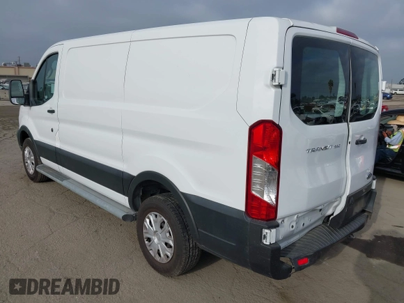 2021 Ford Transit Cargo with VIN 1FTBR1Y85MKA69355, listed as a IAAI auction lot 42544780 with 33,288 mi miles and . Bid and sale history available at DreamBid. Image 3.