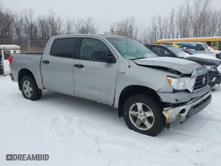 2008 Toyota Tundra 4WD Truck with VIN 5TBDV54118S498651, listed as a IAAI auction lot 41139461 with 243,235 mi miles. Bid and sale history available at carsss.com. Image 1.