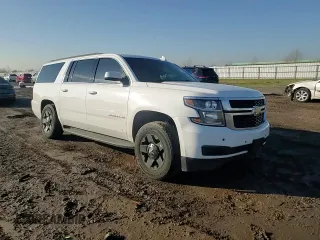 2018 Chevrolet Suburban LS with VIN 1GNSCGKC0JR272245, listed as a Copart auction lot 47000635 with 136,353 mi miles and Salvage title. Bid and sale history available at DreamBid. Image 12.