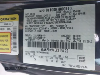 2014 Ford Fusion Titanium with VIN 3FA6P0K94ER115795, listed as a IAAI auction lot 42230295 with 266,277 mi miles and . Bid and sale history available at DreamBid. Image 9.