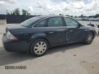 2008 Ford Taurus Limited with VIN 1FAHP25W78G128851, listed as a Copart auction lot 61254015 with 216,335 mi miles and Salvage title. Bid and sale history available at DreamBid. Image 3.