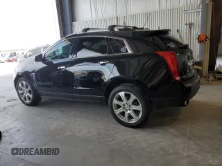 2015 Cadillac SRX Performance Collection with VIN 3GYFNCE34FS631491, listed as a Copart auction lot 64109575 with 102,763 mi miles and Salvage title. Bid and sale history available at DreamBid. Image 2.