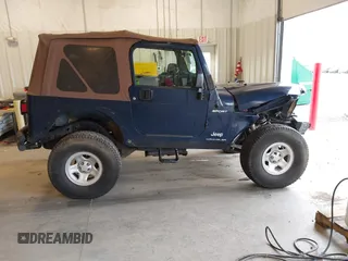 2003 Jeep Wrangler Sport with VIN 1J4FA49S53P311822, listed as a IAAI auction lot 41621710 with 156,023 mi miles. Bid and sale history available at carsss.com. Image 13.