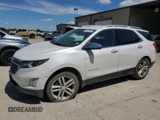 2019 Chevrolet Equinox Premier z VIN 2GNAXYEX9K6275047, wystawiony jako Copart lot #56094945 z przebiegiem 149 060 mil mil oraz Czysty tytuł • Clean title. Historia ofert i sprzedaży dostępna na DreamBid. Obrazek 1.