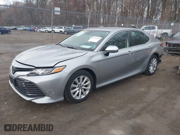 2019 Toyota Camry LE z VIN 4T1B11HK9KU851075, wystawiony jako IAAI lot #41911090 z przebiegiem 114 762 mil mil oraz . Historia ofert i sprzedaży dostępna na DreamBid. Obrazek 2.