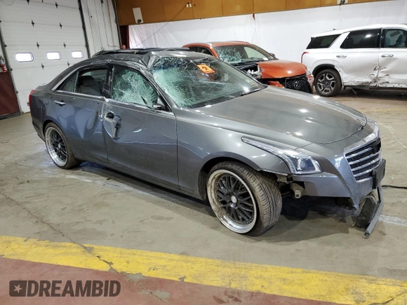 2017 Cadillac CTS Luxury AWD with VIN 1G6AX5SX2H0145966, listed as a Copart auction lot 55835324 with Not provided miles and Salvage title. Bid and sale history available at DreamBid. Image 4.