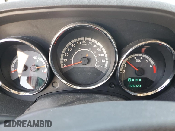 2010 Dodge Caliber Mainstreet z VIN 1B3CB3HA0AD641764, wystawiony jako Copart lot #52440225 z przebiegiem 125 123 mil mil oraz Szkoda całkowita • Salvage title. Historia ofert i sprzedaży dostępna na DreamBid. Obrazek 9.