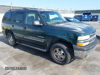 2002 Chevrolet Tahoe LS z VIN 1GNEC13V12R166916, wystawiony jako IAAI lot #42393123 z przebiegiem 228 687 mil mil oraz . Historia ofert i sprzedaży dostępna na DreamBid. Obrazek 1.