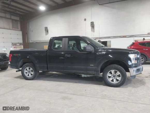 2015 Ford F-150 XLT with VIN 1FTEX1EP4FKE23397, listed as a IAAI auction lot 41665609 with 150,021 mi miles. Bid and sale history available at carsss.com. Image 13.