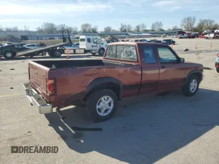 1992 Dodge Dakota z VIN 1B7GL23YXNS633409, wystawiony jako Copart lot #51067775 z przebiegiem 153 174 mil mil oraz Szkoda całkowita • Salvage title. Historia ofert i sprzedaży dostępna na DreamBid. Obrazek 3.