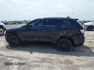 2019 Jeep Grand Cherokee Altitude with VIN 1C4RJEAG0KC857787, listed as a IAAI auction lot 42434646 with 193,968 mi miles and . Bid and sale history available at DreamBid. Image 6.