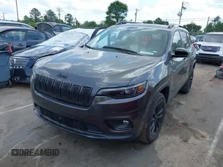 2023 Jeep Cherokee Altitude Lux with VIN 1C4PJMMB0PD115067, listed as a IAAI auction lot 42173993 with 52,180 mi miles. Bid and sale history available at carsss.com. Image 19.