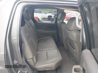 2007 Honda Ridgeline RTL with VIN 2HJYK16517H513832, listed as a IAAI auction lot 42626411 with 209,171 mi miles and . Bid and sale history available at DreamBid. Image 8.