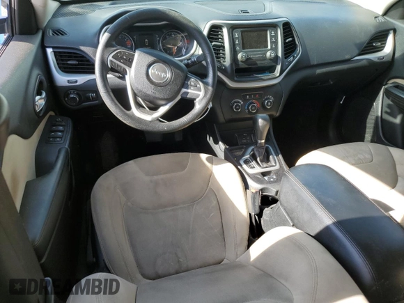 2016 Jeep Cherokee Altitude with VIN 1C4PJLAB2GW291427, listed as a Copart auction lot 52993635 with 129,912 mi miles and Salvage title. Bid and sale history available at DreamBid. Image 8.