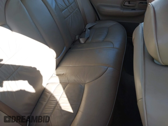 2002 Mercury Grand Marquis LS Premium z VIN 2MEFM75W92X641347, wystawiony jako IAAI lot #41701179 z przebiegiem 79 942 mil mil oraz . Historia ofert i sprzedaży dostępna na DreamBid. Obrazek 8.