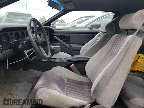 1986 Pontiac Firebird with VIN 1G2FS87S2GL247754, listed as a Copart auction lot 49340634 with 52,081 mi miles and Salvage Title. Bid and sale history available at carsss.com. Image 7.