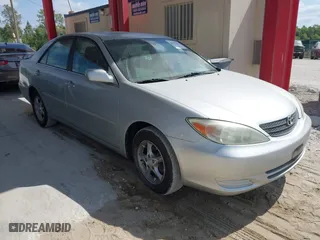 2002 Toyota Camry LE with VIN 4T1BE32K92U554994, listed as a IAAI auction lot 42095207 with 272,777 mi miles. Bid and sale history available at carsss.com. Image 1.