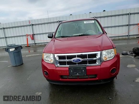2011 Ford Escape XLS with VIN 1FMCU9C75BKC31381, listed as a Copart auction lot 52886575 with 128,640 mi miles and Salvage title. Bid and sale history available at DreamBid. Image 12.