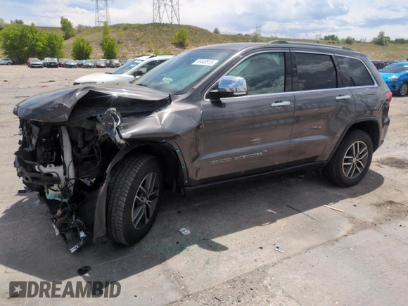 2018 Jeep Grand Cherokee Limited with VIN 1C4RJFBG7JC215005, listed as a Copart auction lot 58440615 with 89,335 mi miles and Salvage title. Bid and sale history available at DreamBid. Image 1.