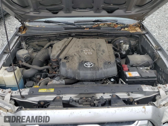 2014 Toyota Tacoma z VIN 5TFUU4EN7EX086617, wystawiony jako Copart lot #58178185 z przebiegiem Nie podano mil oraz Czysty tytuł • Clean title. Historia ofert i sprzedaży dostępna na DreamBid. Obrazek 12.