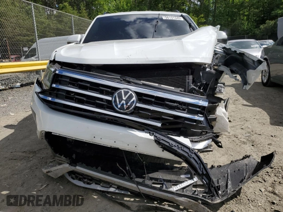 2021 Volkswagen Atlas SE z VIN 1V2LP2CA3MC513383, wystawiony jako Copart lot #56131345 z przebiegiem 75 230 mil mil oraz Szkody całkowita. Historia ofert i sprzedaży dostępna na DreamBid. Obrazek 5.