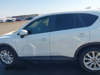 2014 Mazda CX-5 Grand Touring with VIN JM3KE4DY4E0375809, listed as a IAAI auction lot 41468078 with 151,226 mi miles. Bid and sale history available at carsss.com. Image 14.