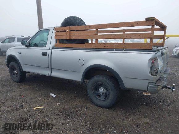 1999 Ford F-150 with VIN 2FTZF1828XCA85643, listed as a IAAI auction lot 41347113 with 173,813 mi miles and . Bid and sale history available at DreamBid. Image 3.