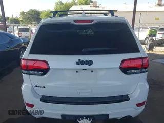 2018 Jeep Grand Cherokee Laredo E with VIN 1C4RJFAG5JC303228, listed as a IAAI auction lot 42375212 with 98,155 mi miles and . Bid and sale history available at DreamBid. Image 16.