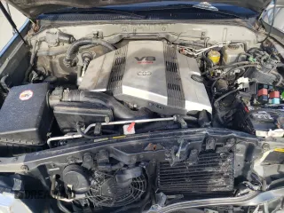 2000 Toyota Land Cruiser with VIN JT3HT05J3Y0088425, listed as a Copart auction lot 41387034 with 243,408 mi miles and Salvage Title. Bid and sale history available at carsss.com. Image 12.