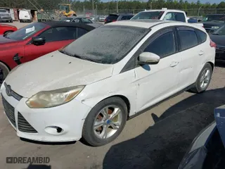 2013 Ford Focus SE with VIN 1FADP3K2XDL175069, listed as a IAAI auction lot 42030874 with 192,539 mi miles. Bid and sale history available at carsss.com. Image 2.