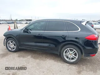 2014 Porsche Cayenne with VIN WP1AA2A21ELA92673, listed as a IAAI auction lot 41597732 with 140,673 mi miles and . Bid and sale history available at DreamBid. Image 15.