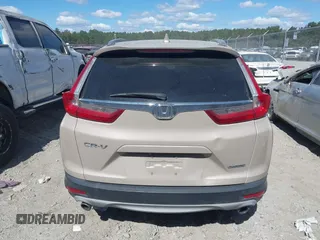 2018 Honda CR-V Touring with VIN 5J6RW1H98JL000031, listed as a IAAI auction lot 40605651 with 129,516 mi miles and . Bid and sale history available at DreamBid. Image 15.