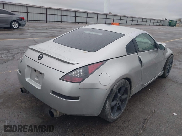 2003 Nissan 350Z Touring z VIN JN1AZ34E43T014247, wystawiony jako IAAI lot #42120812 z przebiegiem 112 263 mil mil oraz . Historia ofert i sprzedaży dostępna na DreamBid. Obrazek 4.